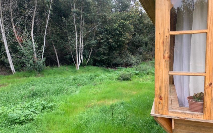 Terreno con casa  ubicada en Paredones