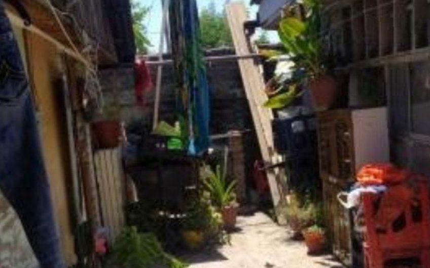 Casa con local comercial